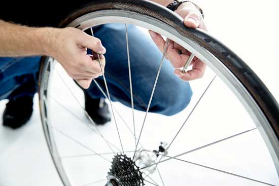 a male individual deflating the tyres